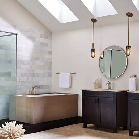 Bold and minimal bathroom with industrial style pendants