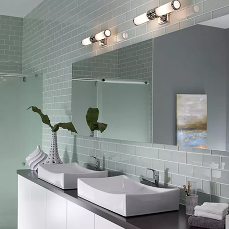 Seafoam green bathroom with white accents