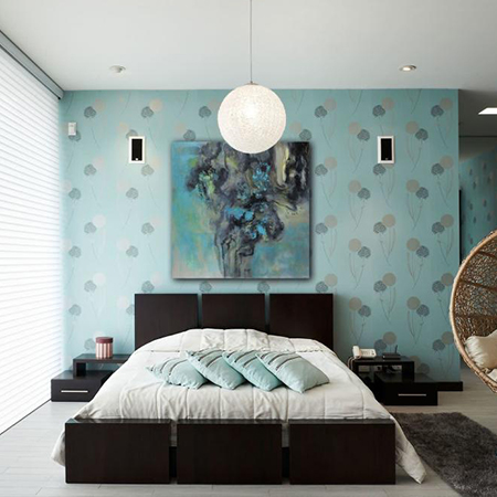 Secluded bedroom with cool aqua colors and dark furniture