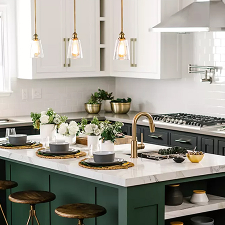 Modern industrial style kitchen with gold and green accents